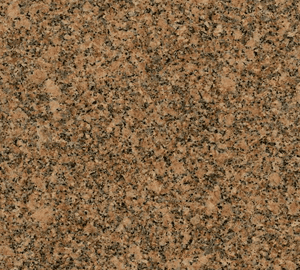 Textura de granito con patrón moteado de colores dorado, negro y gris carioca.